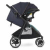 A stroller with the seat folded down and the car seat attached.