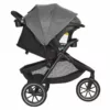 A stroller with the seat folded down and the canopy open.