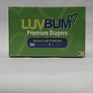 A box of diapers that are green and white