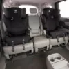 A car with two rows of seats in it