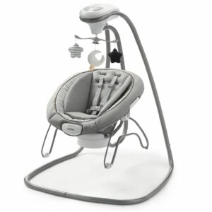 A baby swing with a remote control attached to it.