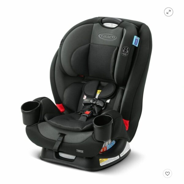 A black and gray car seat with cup holders.