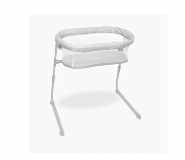 A white bassinet with a stand on top of it.