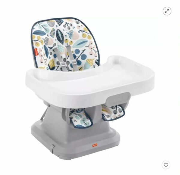 A baby high chair with a tray and seat.