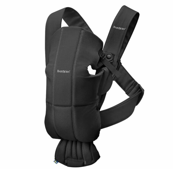 A black baby carrier with a large strap.