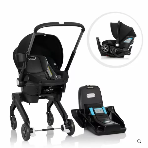 A black stroller and a baby seat