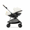 A baby stroller with a car seat attached.