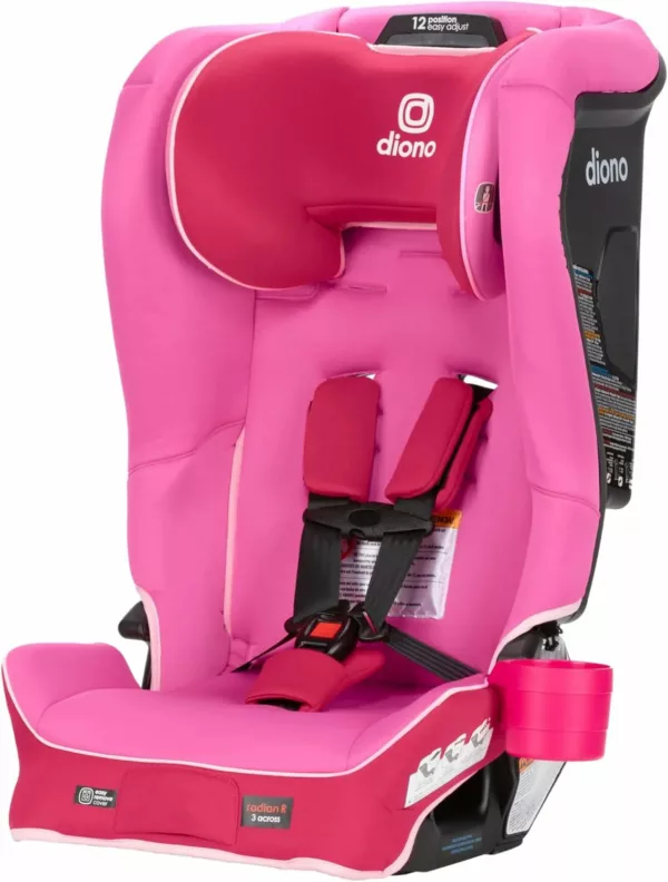 A pink car seat with the harness on.