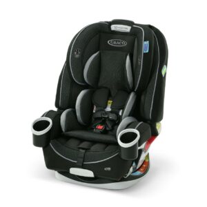 A black and gray car seat with two cups on the side.