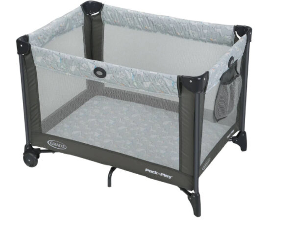 A baby crib with wheels and a canopy.